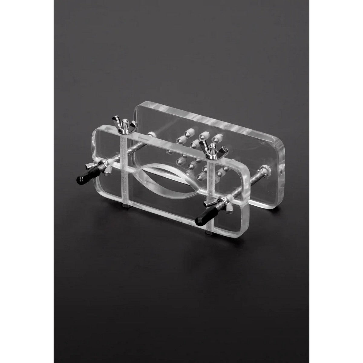 Hodenpresse aus Acryl mit Stacheln